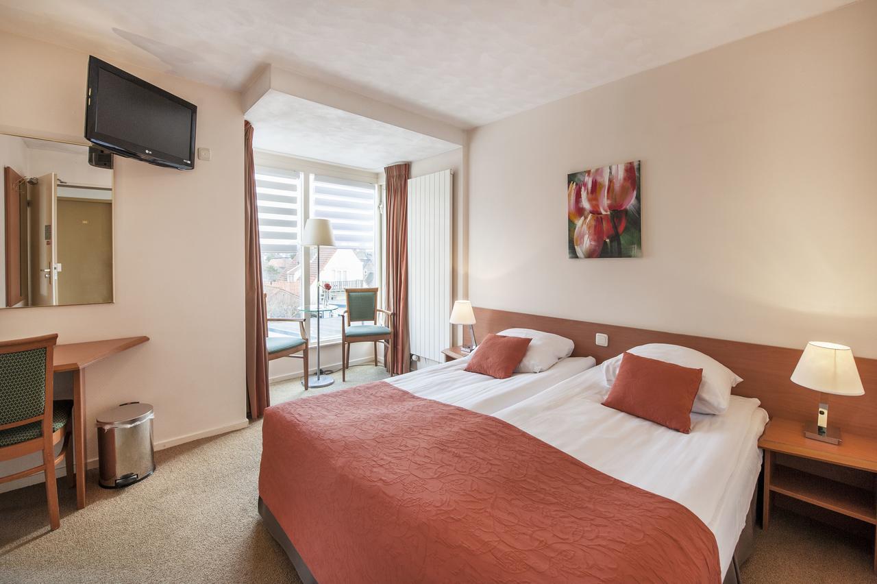 Hotel Victoria Bergen aan Zee Bagian luar foto